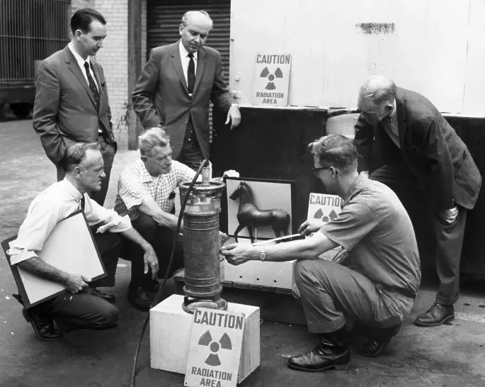Framed Print : Experts Testing the Value of an Ancient Horse Statue Framed Print : Experts Testing the Value of an Ancient Horse Statue