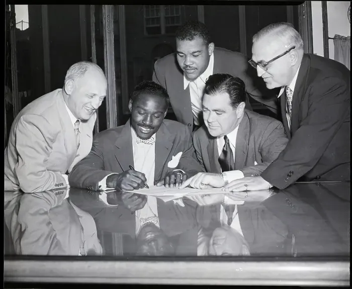 Framed Print : Ezzard Charles Signs Boxing Contract Framed Print : Ezzard Charles Signs Boxing Contract