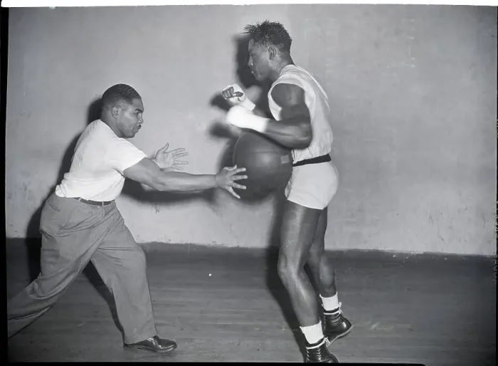 Framed Print : Ezzard Charles and Trainer with Medicine Ball Framed Print : Ezzard Charles and Trainer with Medicine Ball