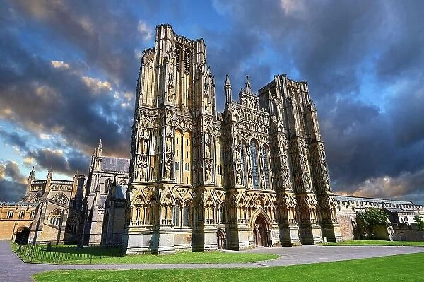 The facade of the medieval Wells Cathedral built in the Early English Gothic style in 1175, Wells, Somerset, England, United Kingdom
