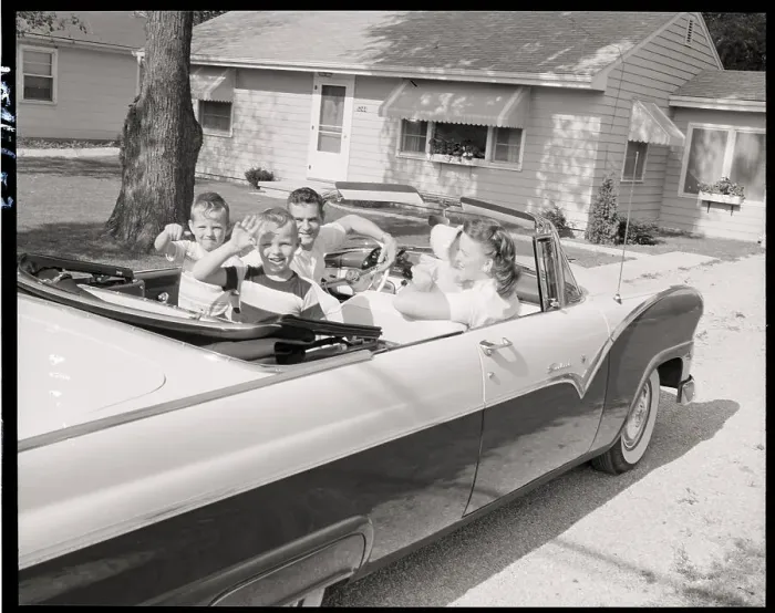 Framed Print : Family in Convertible Waving Framed Print : Family in Convertible Waving