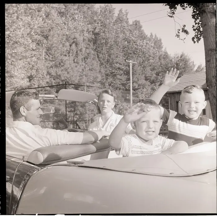 Framed Print : Family Drives Away In Convertible Framed Print : Family Drives Away In Convertible