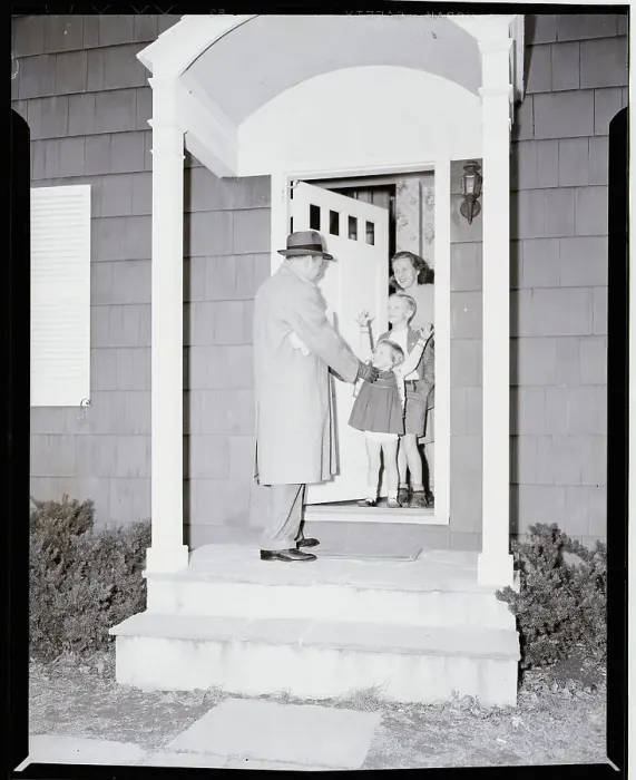 Framed Print : Family Greeting Father at Door