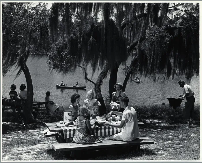 Framed Print : Family Having a Lakeside Picnic Framed Print : Family Having a Lakeside Picnic