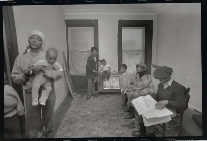 Framed Print : Family with No Heat Wearing Coats in Apartment Framed Print : Family with No Heat Wearing Coats in Apartment