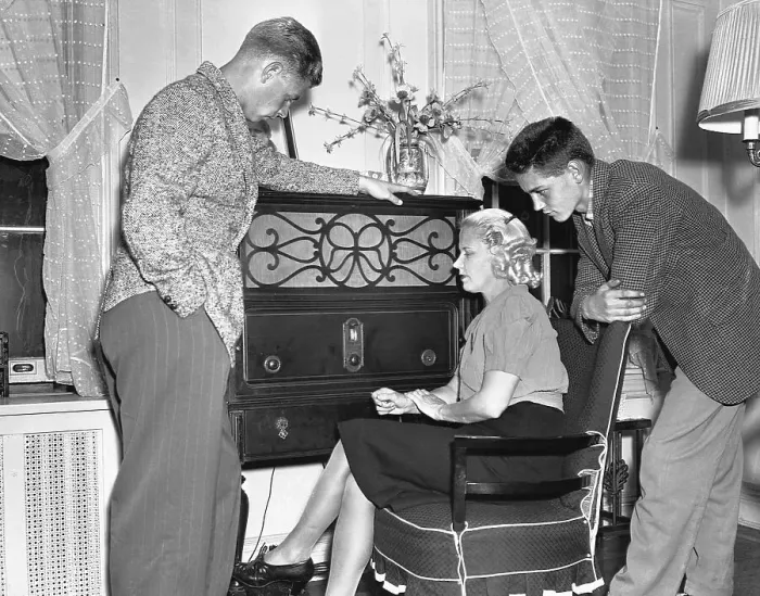 Framed Print : Family Listening to News on the Radio Framed Print : Family Listening to News on the Radio
