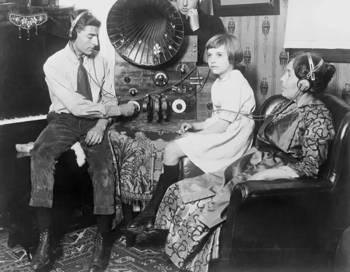 Framed Print : Family Listening to a Radio Framed Print : Family Listening to a Radio