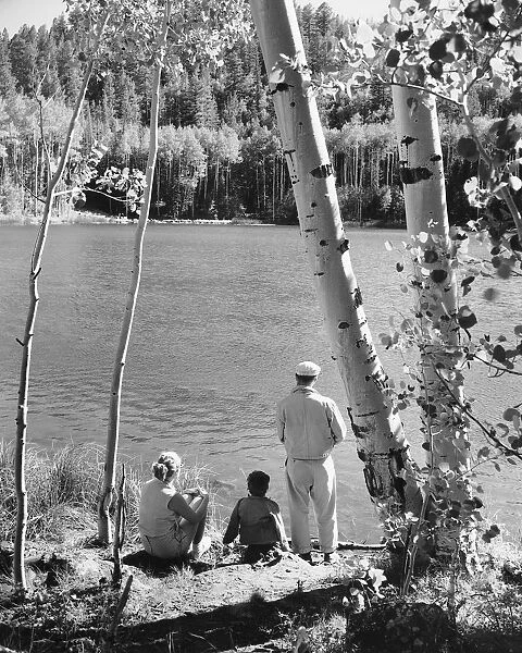 Family looking at lake