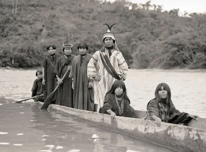 Framed Print : Family Members in Dugout Canoe Framed Print : Family Members in Dugout Canoe