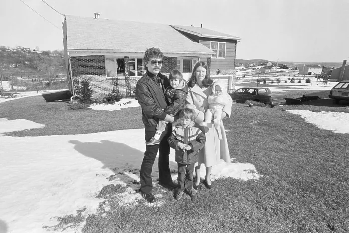 Framed Print : Family Outside Radon Contaminated Home Framed Print : Family Outside Radon Contaminated Home