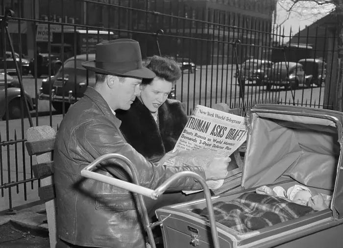 Framed Print : Family Reading Newspaper Headline of Truman Reviving Draft Framed Print : Family Reading Newspaper Headline of Truman Reviving Draft