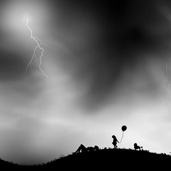 Family relaxing watching a storm