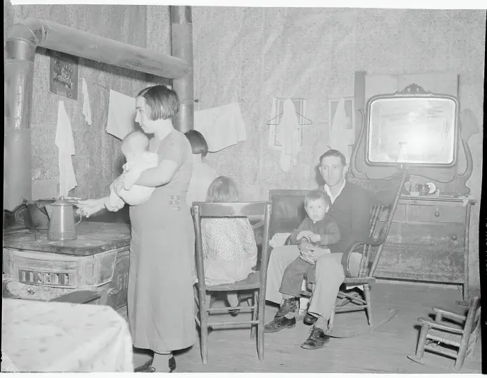 Framed Print : Family in Their One Room Home Framed Print : Family in Their One Room Home