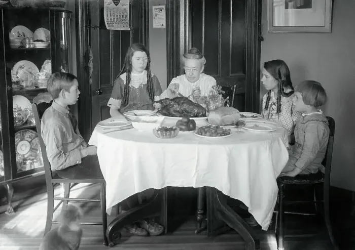 Framed Print : Family Sitting Around Dinner Table Framed Print : Family Sitting Around Dinner Table
