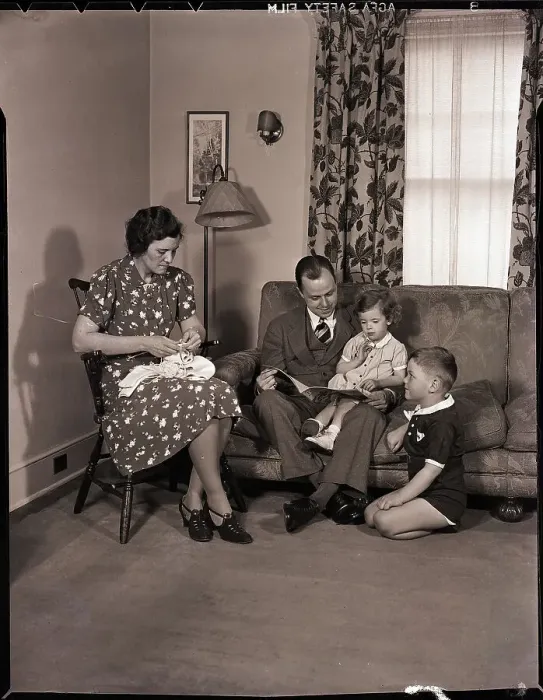 Framed Print : Family Sitting in Living Room