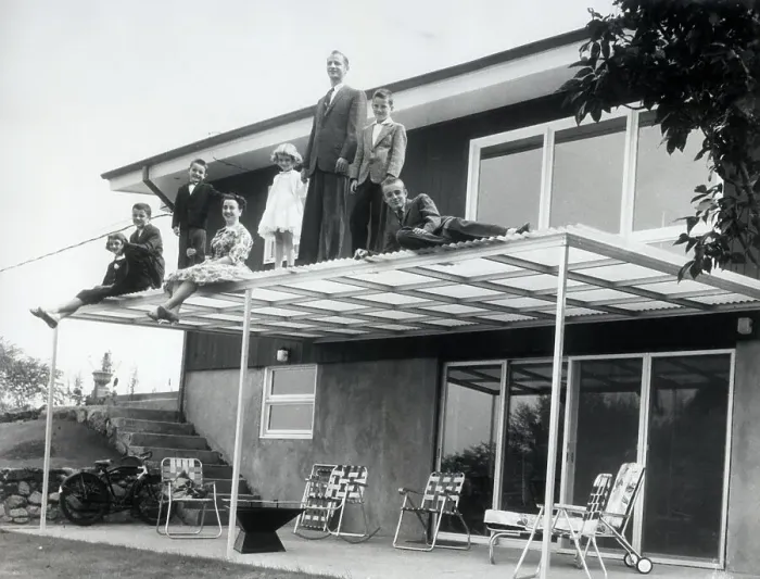 Framed Print : Family Standing on Patio Overhang Framed Print : Family Standing on Patio Overhang