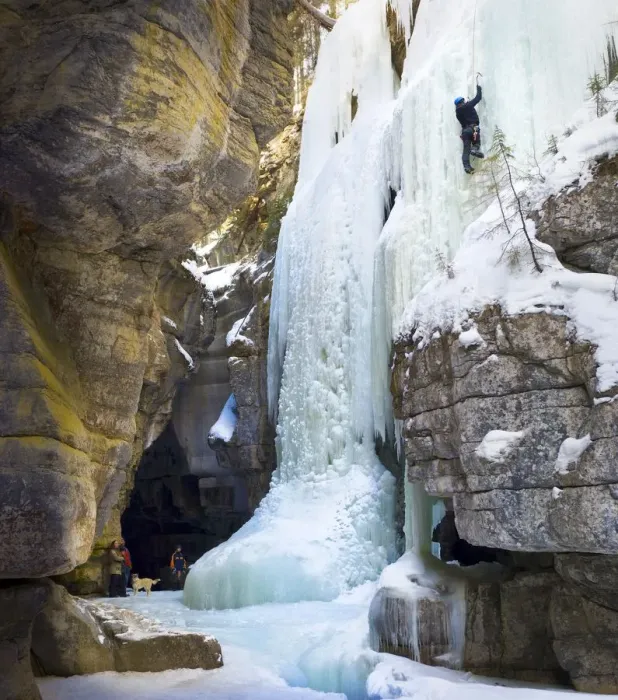 Framed Print : Family watching an ice climber on a frozen waterfall, Jasper National Park, Alberta, Canada