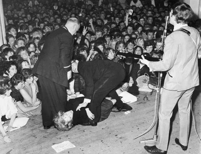 Framed Print : Fan Faints as John Lennon Sings Framed Print : Fan Faints as John Lennon Sings
