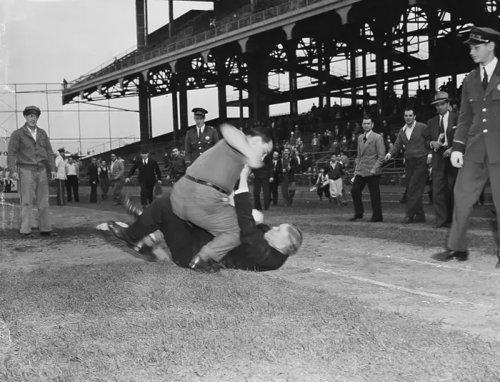 Framed Print : Fan Fighting with Umpire Framed Print : Fan Fighting with Umpire