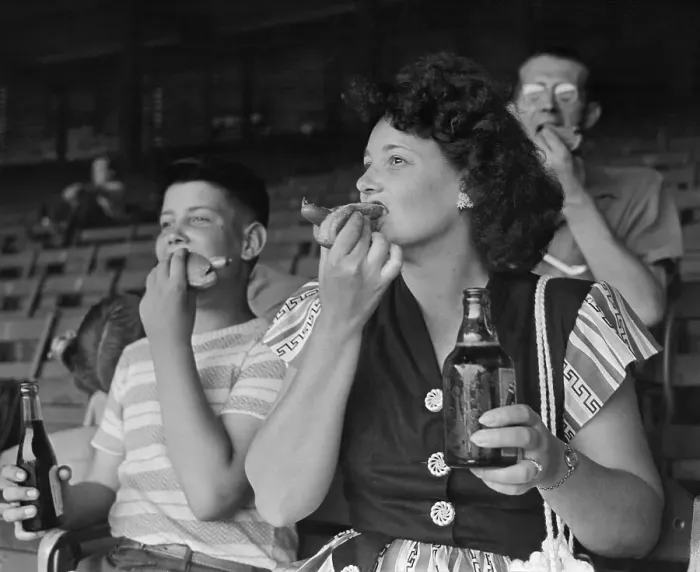 Framed Print : Fans Enjoying Hot Dogs Framed Print : Fans Enjoying Hot Dogs