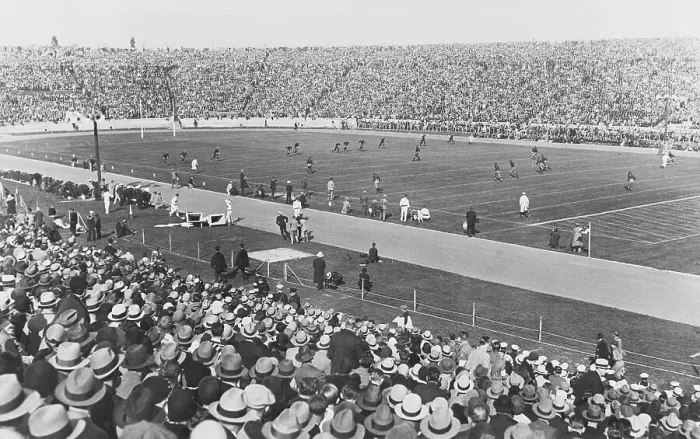 Framed Print : Fans Watching a Football Game Framed Print : Fans Watching a Football Game