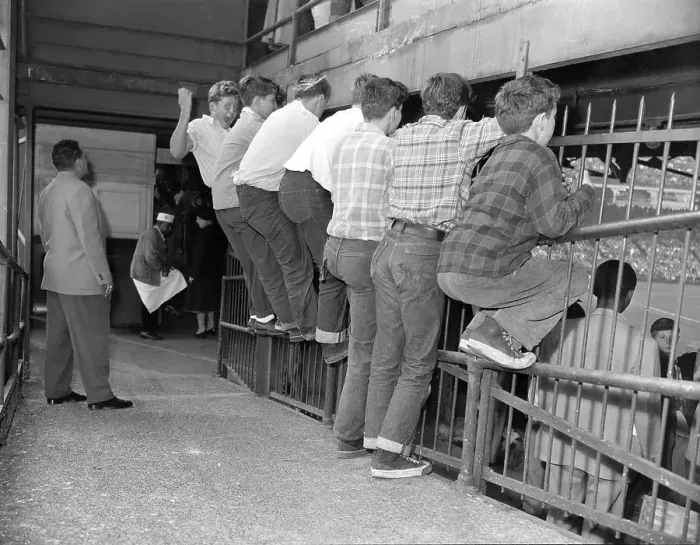 Framed Print : Fans Watching Game Through Fence Framed Print : Fans Watching Game Through Fence
