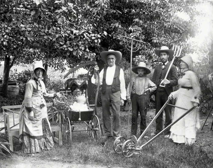 Framed Print : Farm Family Poses With Farming Implement Framed Print : Farm Family Poses With Farming Implement