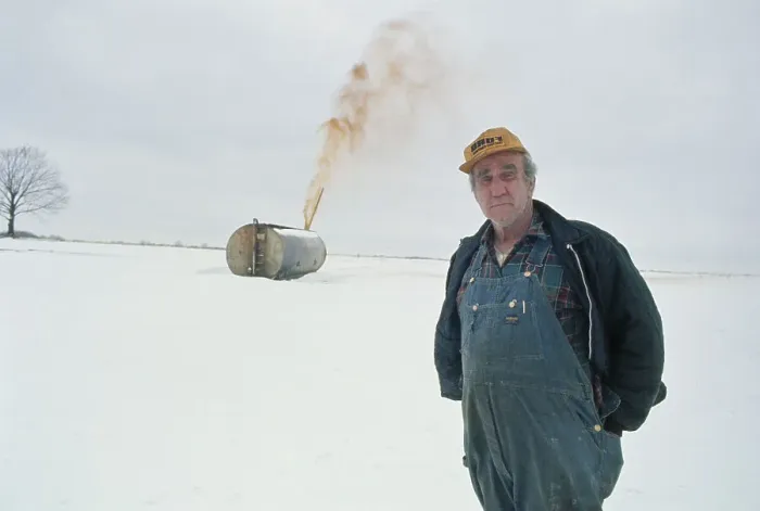 Framed Print : Farmer With Tank Spewing Gas Framed Print : Farmer With Tank Spewing Gas