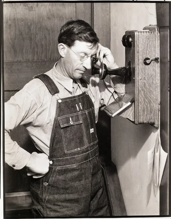 Framed Print : Farmer Using Telephone