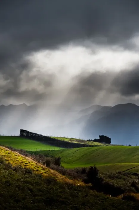 Framed Print : Farmland against dark cloudy sky Framed Print : Farmland against dark cloudy sky