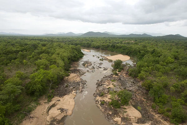 Faro river, located in the Faro-Lobeke hunting zone, looking north-eastwards towards mountains of the Adamawa Plateau (Massif de l Adamaoua), near to Faro National Park, Northern Cameroon