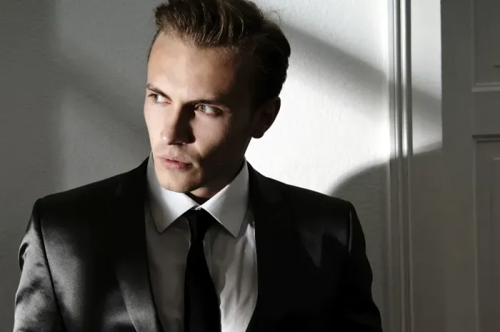 Framed Print : Fashion image, young man wearing a suit Framed Print : Fashion image, young man wearing a suit