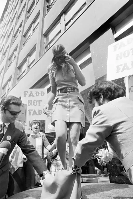 Framed Print : Fashion Protesters Cutting Dress, Mini-Skirt Framed Print : Fashion Protesters Cutting Dress, Mini-Skirt