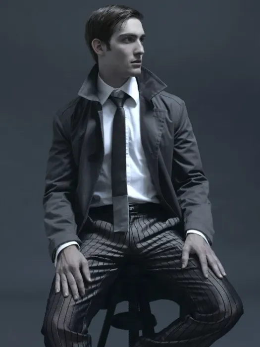 Framed Print : Fashion shot of a man in a suit and jacket, sitting on a stool Framed Print : Fashion shot of a man in a suit and jacket, sitting on a stool