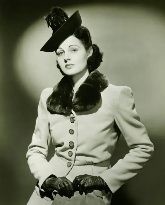 Framed Print : Fashionable woman in fur trimmed suit posing in studio, (B&W), portrait