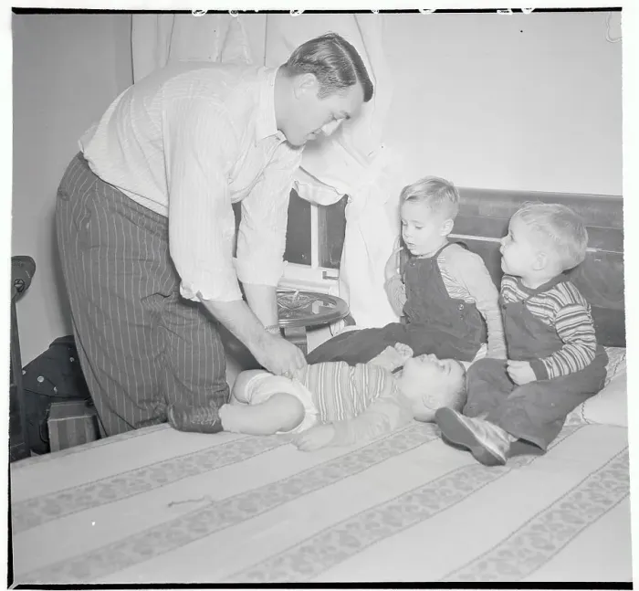Framed Print : Father Changing Diapers Framed Print : Father Changing Diapers