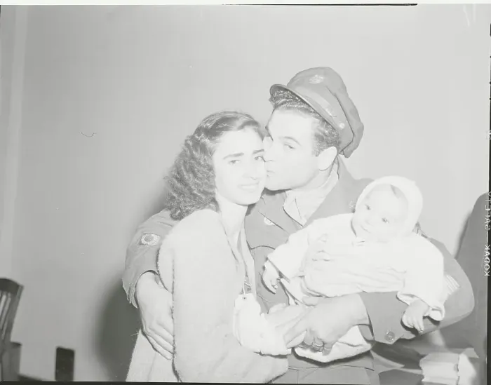 Framed Print : Father and Husband Reunited with Family