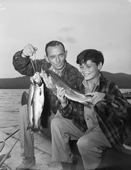 Framed Print : Father And Son Sitting With Salmon Framed Print : Father And Son Sitting With Salmon