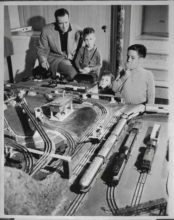 Framed Print : Father and Sons with Model Train Set Framed Print : Father and Sons with Model Train Set