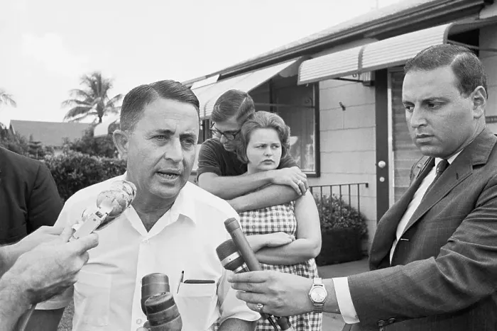 Framed Print : Father Talking to Press on Son's Murder Spree