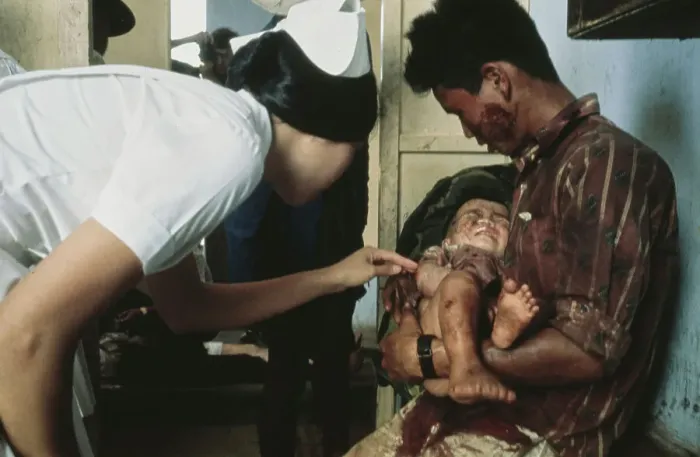 Framed Print : Father & Wounded Child, Vietnam War