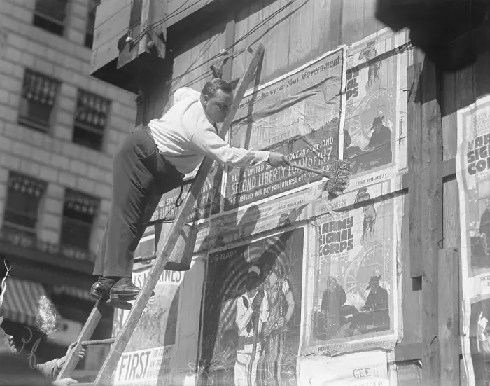 Framed Print : Fatty Arbuckle Putting Poster Up Framed Print : Fatty Arbuckle Putting Poster Up