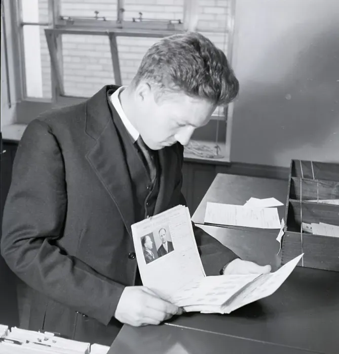 Framed Print : FBI Expert Examining Fingerprint Records Framed Print : FBI Expert Examining Fingerprint Records