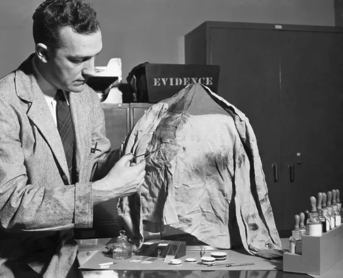 Framed Print : FBI Lab Technician Cuts Fabric Sample Framed Print : FBI Lab Technician Cuts Fabric Sample