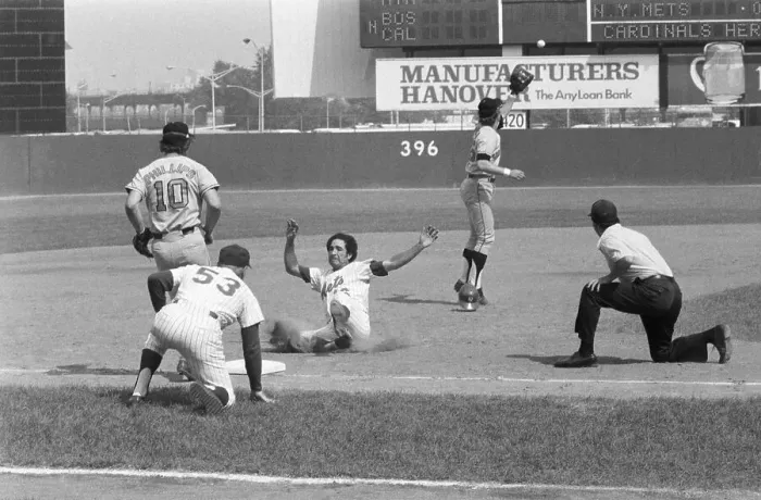 Framed Print : Felix Millan Slides Safely Into Third
