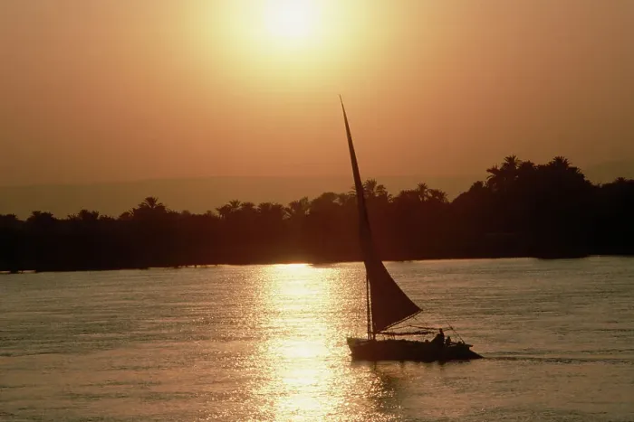Framed Print : Felucca Sailing at Sunset