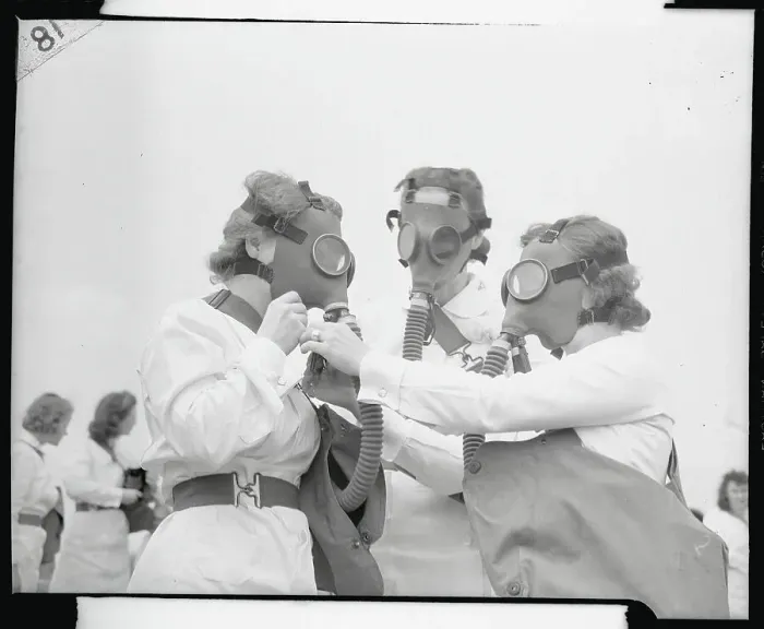 Framed Print : Three Female Army Nurses Adjusting Their Gas Masks