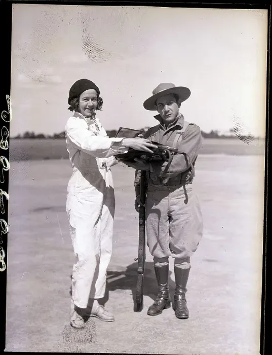 Framed Print : Female Aviatrix with Cuban Soldier Framed Print : Female Aviatrix with Cuban Soldier