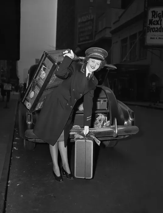 Framed Print : Female Bellhop at the Hotel Astor Framed Print : Female Bellhop at the Hotel Astor