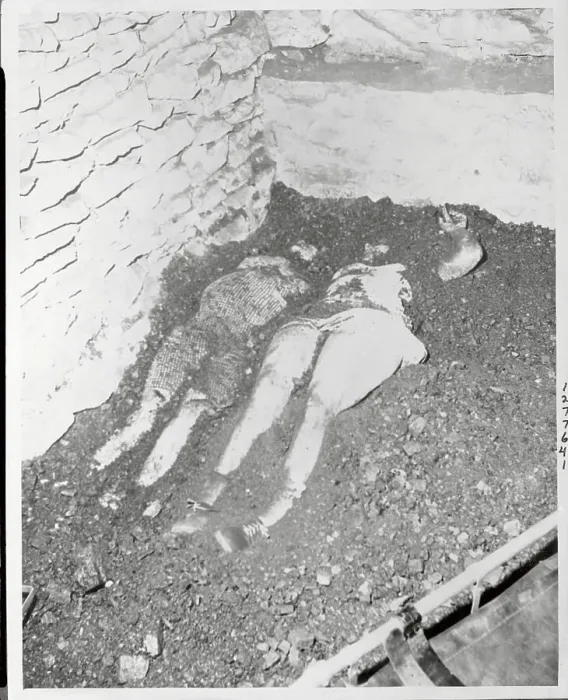 Framed Print : Two Female Bodies Lying in Coal Pile Framed Print : Two Female Bodies Lying in Coal Pile